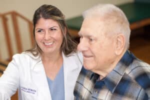 Zoomed in Napa Valley Care Center rehab therapist with a resident